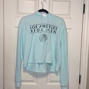 cropped light blue los angeles /new york hoodie